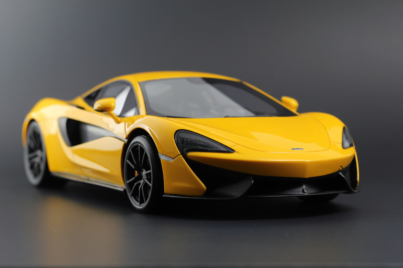 Illustration for article titled TopSpeed's Volcano Yellow McLaren 570s